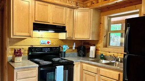 Coffee/tea maker, fridge, microwave, oven - Wildcat Cabin • Pet Friendly, Hot Tub, Forest Stay (Stanton)