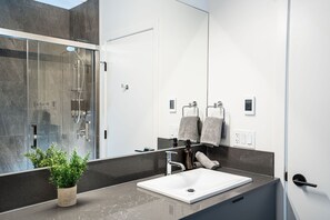 Bathtub, hair dryer, towels