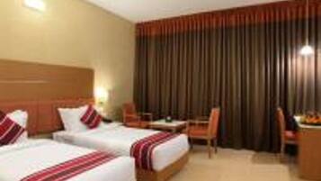 Deluxe Double Room | Premium bedding, in-room safe, laptop workspace, blackout curtains