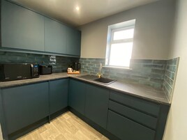 Deluxe Apartment | Private kitchen | Electric kettle