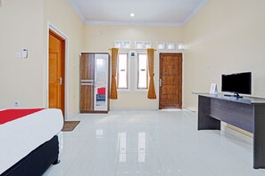 Suite Deluxe | Espacio para trabajar con laptop, wifi gratis y ropa de cama