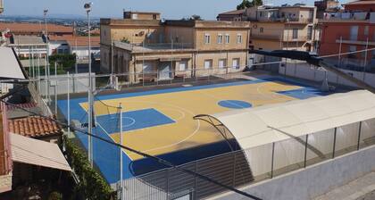 Monolocale con divano letto e cucina