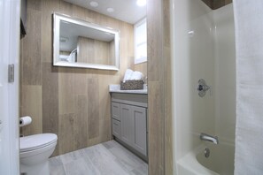 Combined shower/tub