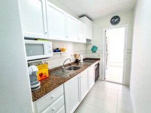 Fridge, microwave, oven, coffee/tea maker