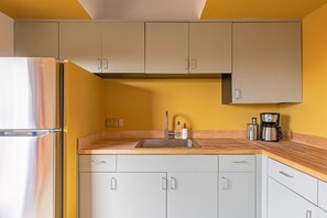 Fridge, microwave, oven, stovetop - Monument House by Homestead Modern (Joshua Tree)