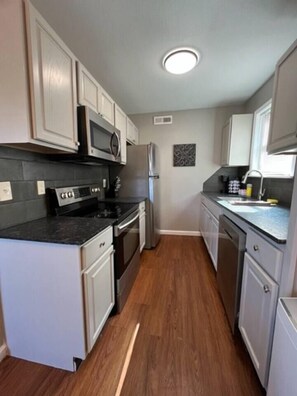Fridge, microwave, oven, stovetop - Savannah: 1st Floor-Walk to A&M-Comfy King Beds (Bryan)