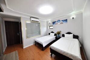 Habitación familiar, vista a la ciudad | Tabla de planchar con plancha y wifi gratis