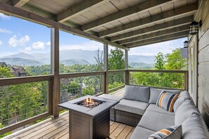 Cabin, 4 Bedrooms | Balcony - Grizzlies Den 4 Bedroom Cabin by RedAwning (Gatlinburg)