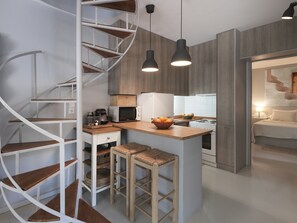 Deluxe Villa | Private kitchen | Full-size fridge, microwave, oven, stovetop