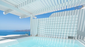 A modern infinity pool with a clear view of the sea and a white pergola structure. - Iatis View Collection (Santorini)