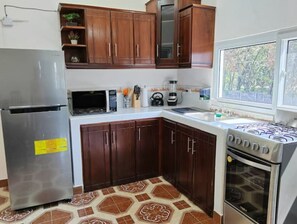 Fridge, microwave, coffee/tea maker, toaster