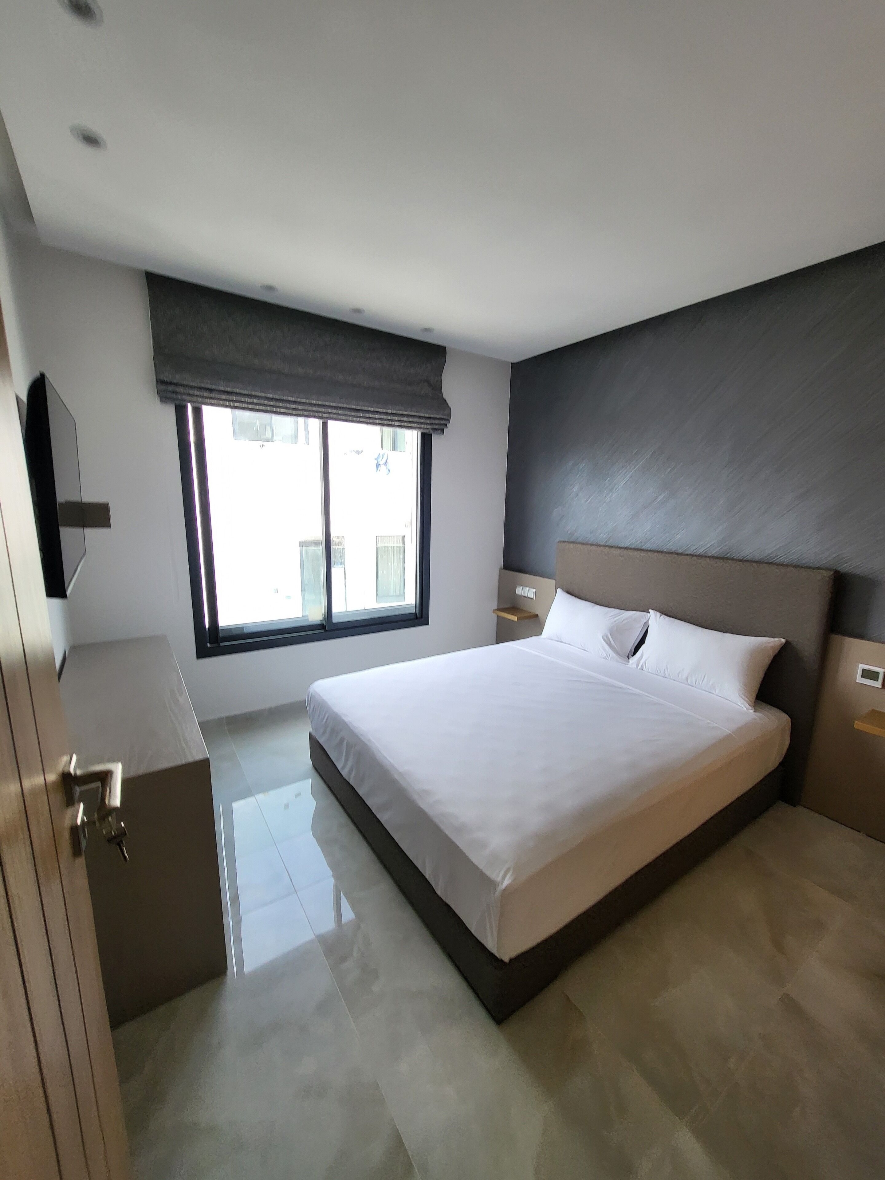 Deluxe appartement, 3 slaapkamers | Een strijkplank/strijkijzer, gratis wifi