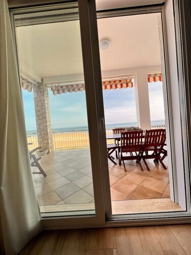 Terrace with sunrise view. 1 minute walk to the beach. A/C