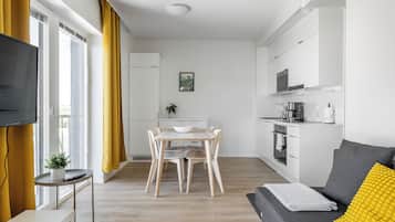 Standard Apartment, 2 Bedrooms | Living room | Flat-screen TV