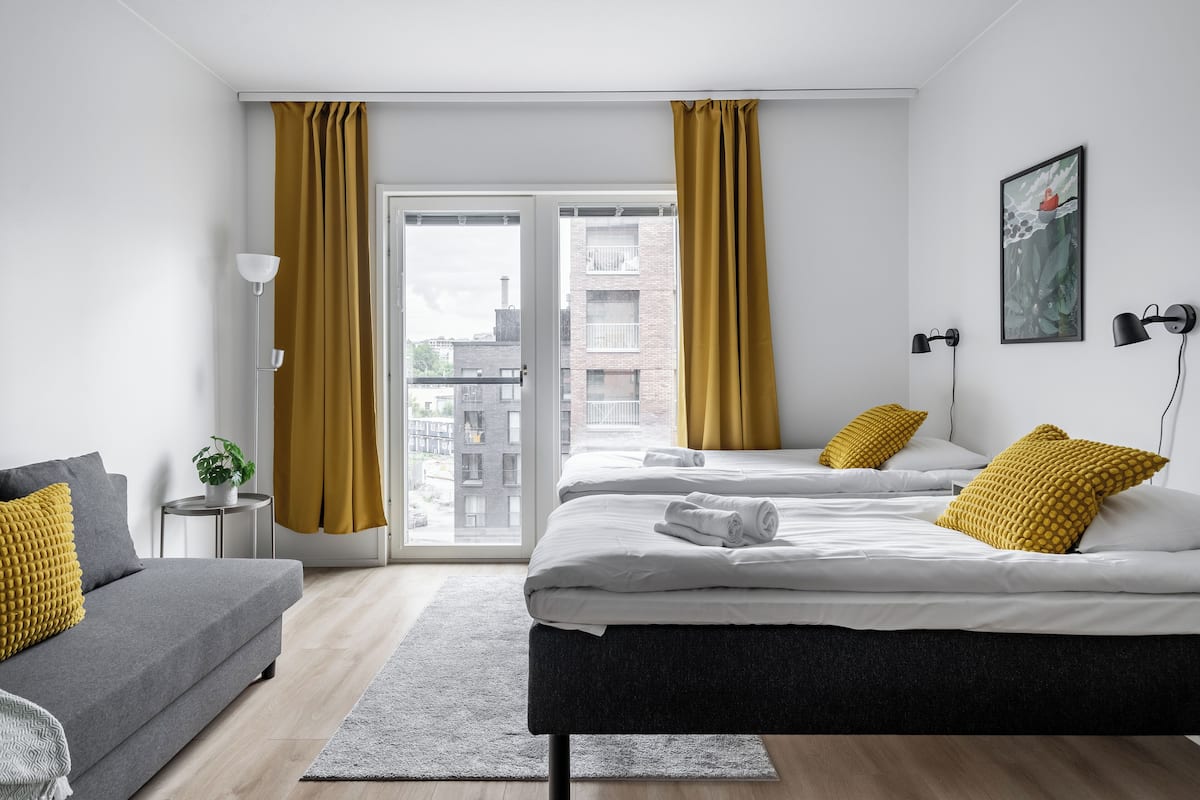 Standard Studio, Multiple Beds | Living area | Flat-screen TV