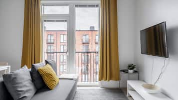 Business Apartment, 1 Bedroom | Living area | Flat-screen TV