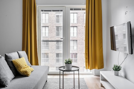 Standard Apartment, 1 Bedroom | Living area | Flat-screen TV