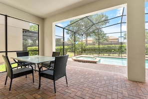 Relax by the pool surrounded by a beautiful view of the surrounding landscape.