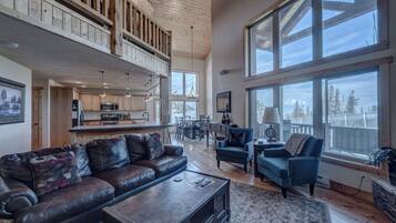 Luxury Chalet, Mountain View | Living room | 42-inch TV with cable channels, fireplace