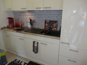 Fridge, microwave, coffee/tea maker, toaster