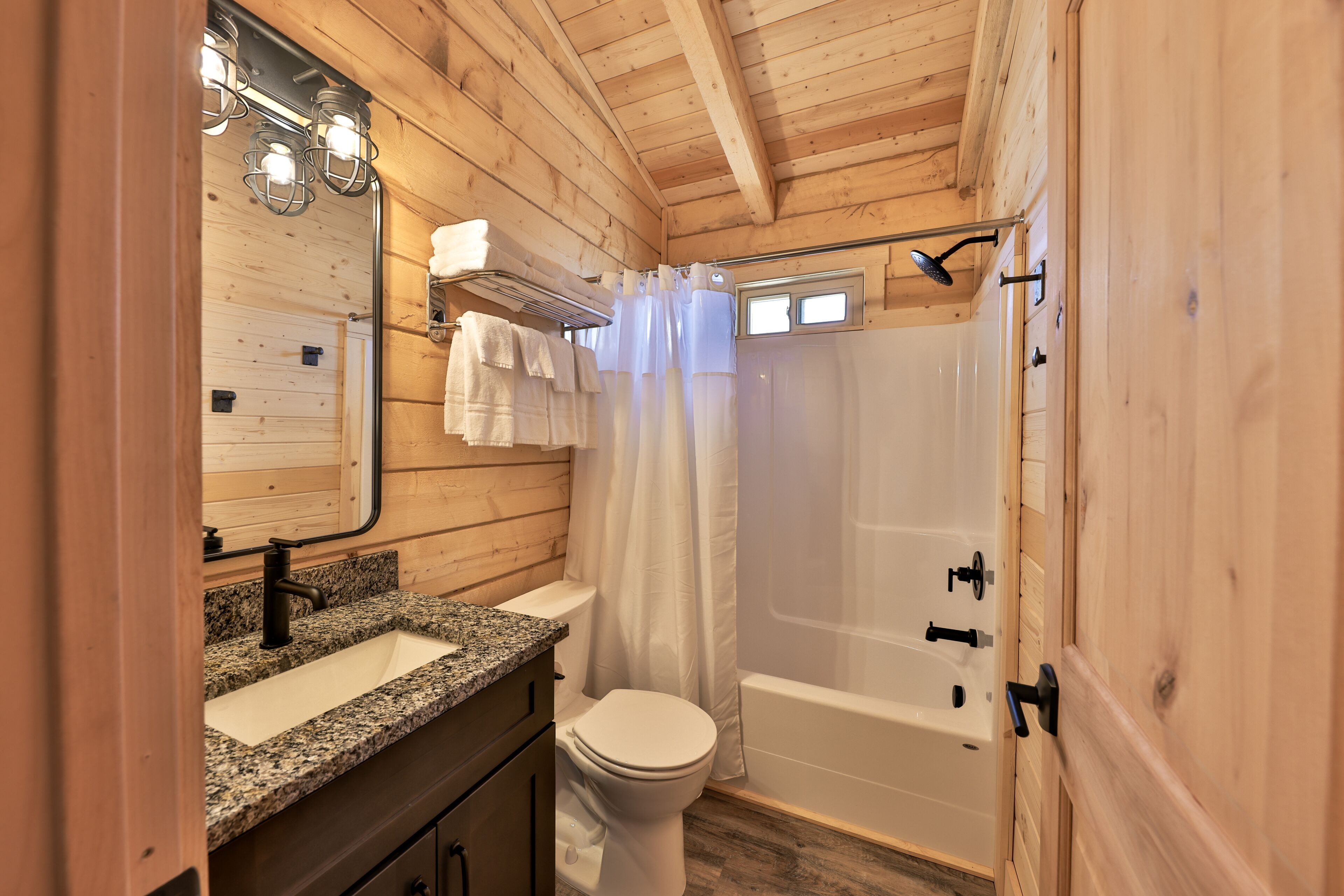 Combined shower/bathtub, hair dryer, towels, soap