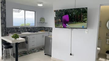 Fridge, microwave, stovetop, cookware/dishes/utensils