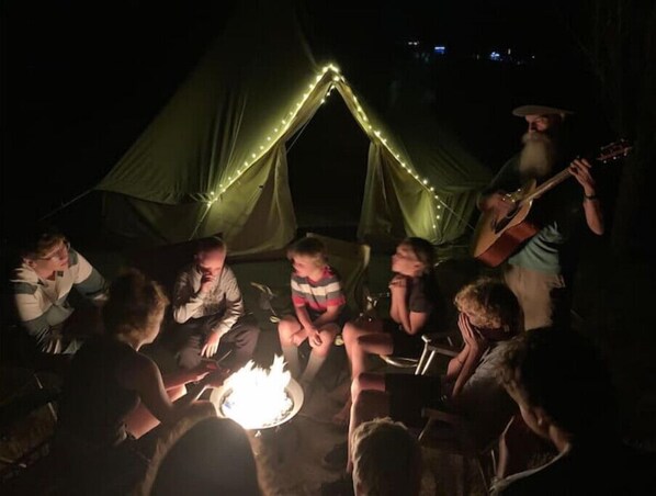 Gather around the campfire for a warm, social experience.