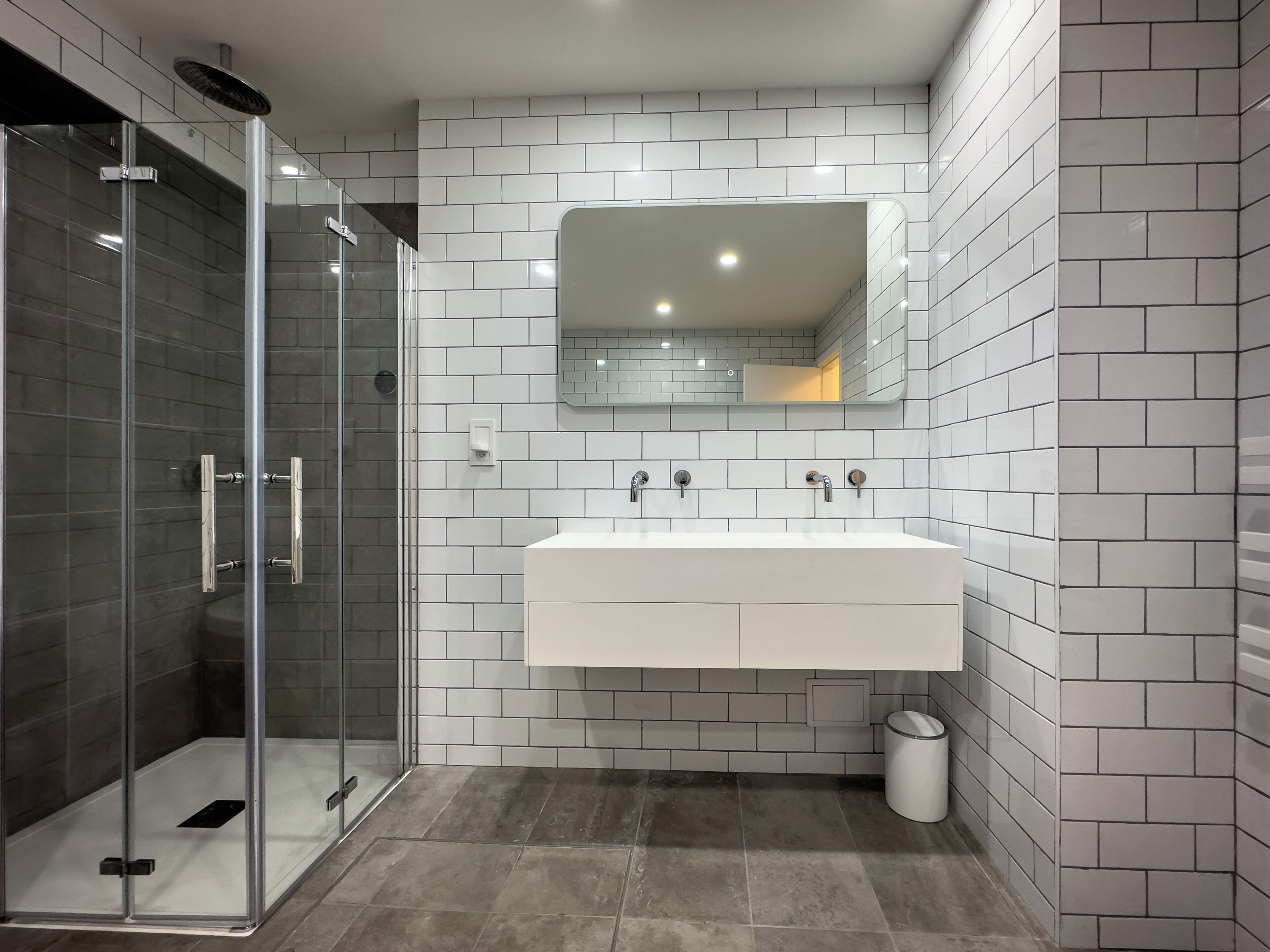 Shower, rainfall showerhead, hair dryer, towels