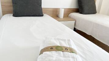 3 slaapkamers, een strijkplank/strijkijzer, beddengoed