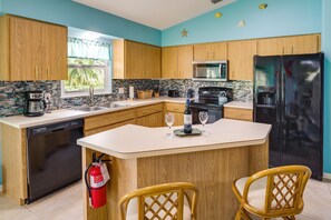 Fridge, microwave, stovetop, dishwasher - Pet-Friendly Sebastian Home: w/ Porch + Lake View! (Sebastian)