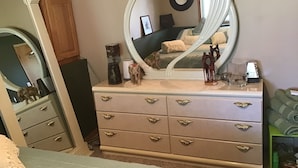 A bedroom with a vanity, dresser, and a large mirror. - Location: By Target Center, US Bank Stadium, Target Field & Blaine Sports Ctr! (Blaine)