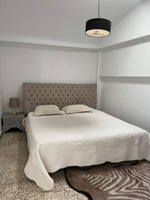 1 habitación, tabla de planchar con plancha, wifi y ropa de cama 