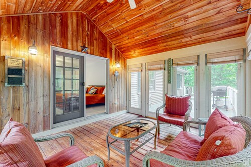 Waterfront home with a fireplace, grill, deck, washer/dryer, & AC - dog-friendly