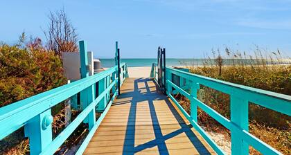 Ocean view studio with resort amenities, private balcony, beach access, & AC
