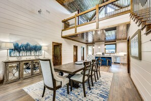 Enjoy meals in this elegant dining area with a large table and six comfortable chairs.