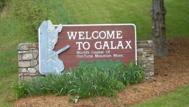 A welcome sign for Galaxy, labeled as the world's capital of old-time mountain music. - Blue Ridge Mountain Getaway (Galax)