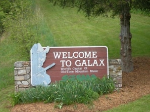 A welcome sign for Galaxy, labeled as the world's capital of old-time mountain music. - Blue Ridge Mountain Getaway (Galax)