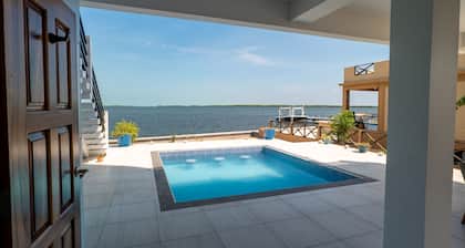 Amazing 2 story oceanfront house with pool, balcony, central AC, & W/D