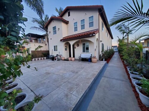 4 Bedrooms 3 Full Bath hops away from Marina & Beach.
