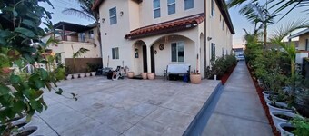 4 Bedrooms 3 Full Bath hops away from Marina & Beach.