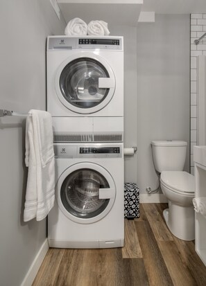 Hair dryer, towels, soap, shampoo