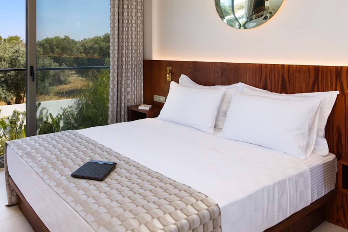 Egyptian cotton sheets, premium bedding, down duvets, minibar