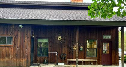 Escape to Nature in This Cozy Riverfront Cabin