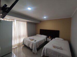 Standaard Twin kamer, 2 slaapkamers | Een laptopwerkplek, gratis wifi, beddengoed