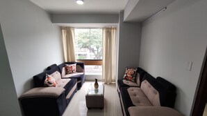 Standard Suite, 1 Double Bed | Living area | Smart TV - Inti Llaqta Hotel & Suites (Lima)