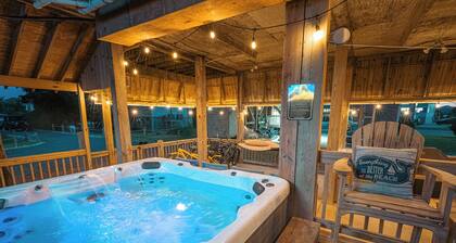 HUGE COVERED DECK, LARGE HOT TUB, 65” DECK TV, 6 BEACH CRUISERS, AND 3 KAYAKS!