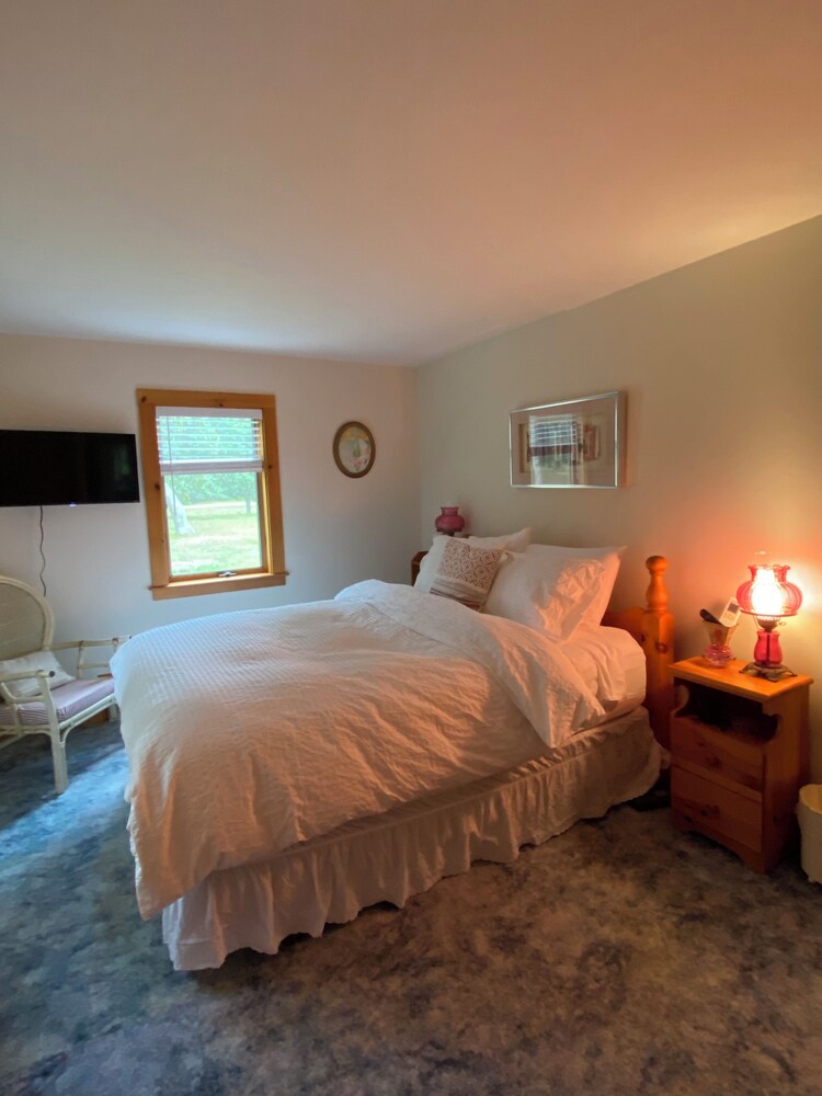 Ocean sounds at this Oyster Pond retreat pastoral view and short walk