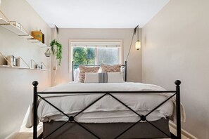 2 bedrooms, desk, iron/ironing board, travel crib