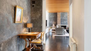 A modern interior with a dining area, a fireplace, and a view into another room. - DOMICILE RELAX" between Salem Monastery & Heiligenberg Castle - comfort on 80sqm (Salem)