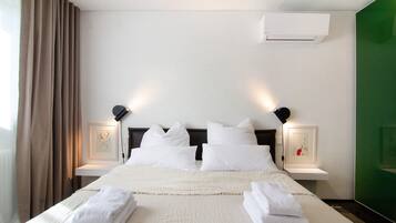 1 chambre, fer et planche Ă repasser, Wi-Fi gratuit, draps fournis